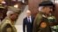 Евгений Пригожин (в центре на заднем плане) виден на встрече российских и ливийских военных в Москве на скриншоте видеозаписи, опубликованной 7 ноября 2018 года самопровозглашенной Ливийской национальной армией.