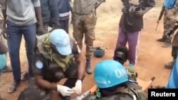 (FILE) Social media footage shows people gathering at a UN peacekeeper camp after attacks in Sudan-South Sudan border region.