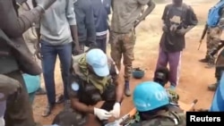 FILE - Social media footage shows people gathering at a UN peacekeeper camp after attacks in Sudan-South Sudan border region, January 28, 2024.