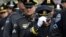 Junto al vicepresidente Joe Biden asistieron a la ceremonia fúnebre miles de policías.