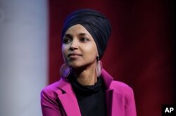 FILE - In this Jan. 31, 2020, file photo, Rep. Ilhan Omar, D-Minn., participates in a panel during a campaign event for Democratic presidential candidate Sen. Bernie Sanders in Clive, Iowa. Omar on Monday, June 15, announced the death of her father…