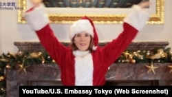 U.S. Ambassador to Japan Caroline Kennedy dressed up as Santa Clause for the embassy's version of the popular "koi" dance.