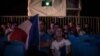 A father and daughter take in France's opening game together. The European championships are being held across the country. 