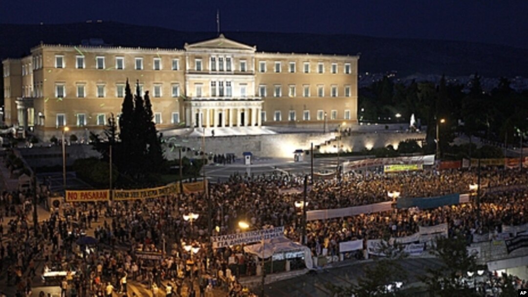 Demonstrators gather in front of the Parliament in Athens' main Syntagma Square, June 15, 2011