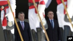 Los presidentes Mauricio Macri y Jair Bolsonaro se mostraron de acuerdo en unirse a Estados Unidos en el aumento de la presión por un cambio democrático en Venezuela.