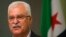 FILE - George Sabra, a veteran Christian opposition figure and acting President of the Syrian National Coalition, speaks during a news conference in Istanbul, May 13, 2013.