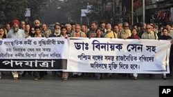 Indian intellectuals and others walk in a rally demanding immediate release of human rights activist Dr. Binayak Sen, in Calcutta, India, 11 Jan 2011