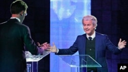နယ်သာလန် ဝန်ကြီးချုပ် Mark Rutte နှင့် လက်ယာယိမ်း ခေါင်းဆောင် Geert Wilders တို့ စကား စစ်ထိုးနေစဉ်။