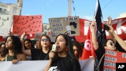 Tunisians protest against President Kais Saied ahead of the upcoming presidential elections, Sept. 13, 2024, in the capital of Tunis. 