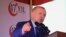 Le président turc Recep Tayyip Erdogan, parle avant un défilé militaire marquant le 47e anniversaire de l'invasion turque de 1974 à Nicosie, Chypre, mardi 20 juillet 2021. 