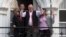 Flanked by his running mates Mercedes Araoz, right, and Martin Vizcarra, presidential candidate Pedro Pablo Kuczynski acknowledges supporters and reporters gathered outside his home in Lima, Peru, Monday, June 6, 2016.