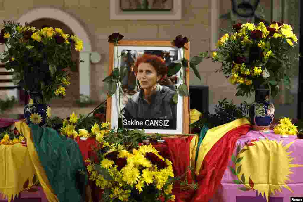 A portrait of late founder member of the Kurdistan Workers' Party (PKK) Sakine Cansiz is seen at the Kurdish cultural center in Paris, France. Three female Kurdish activists were fatally shot in Paris overnight in execution-style killings.