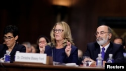 Professor Christine Blasey Ford, who has accused U.S. Supreme Court nominee Brett Kavanaugh of a sexual assault in 1982, testifies before a Senate Judiciary Committee confirmation hearing for Kavanaugh on Capitol Hill in Washington.