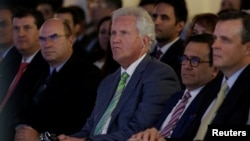 General Electric Co. Chief Executive Jeff Immelt (center) and Mexican Economy Minister Ildefonso Guajardo (second right) attend the opening of a new tower of the Global Operations Center in San Pedro Garza Garcia, neighboring Monterrey, Mexico, May 12, 2017.