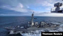 FILE PHOTO: The U.S. Navy guided-missile destroyer USS Kidd, an Arleigh Burke-class guided-missile destroyer, transited ‘through international waters in accordance with international law,’ the U.S. Navy said in a statement.