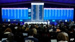 FILE — The latest election results are displayed at the Results Operation Centre (ROC) in Midrand, Johannesburg, South Africa, Friday May 31, 2024. 