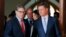 Russian Energy Minister Alexander Novak, right, welcomes U.S. Secretary of Energy Rick Perry for talks in Moscow, Russia, Sept. 13, 2018. 
