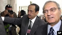 Syrian Vice President Farouk al-Sharaa, right (file photo)