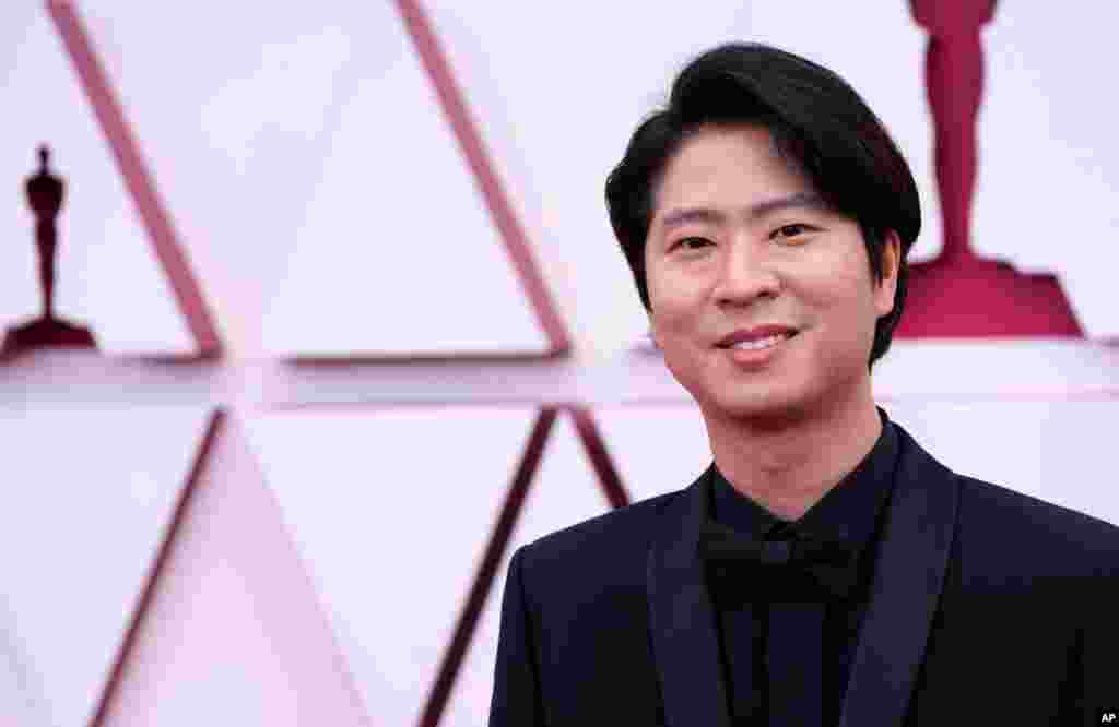 Erick Oh arrives at the Oscars on Sunday, April 25, 2021, at Union Station in Los Angeles. (AP Photo/Chris Pizzello, Pool)