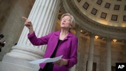 Sen. Elizabeth Warren, D-Mass. reacts to being rebuked by the Senate leadership and accused of impugning a fellow senator, Attorney General-designate, Sen. Jeff Sessions, R-Ala., Feb. 8, 2017, on Capitol Hill in Washington.