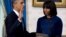 President Obama takes the oath of office at the official swearing-in ceremony in the Blue Room of the White House Jan. 20, 2013. 