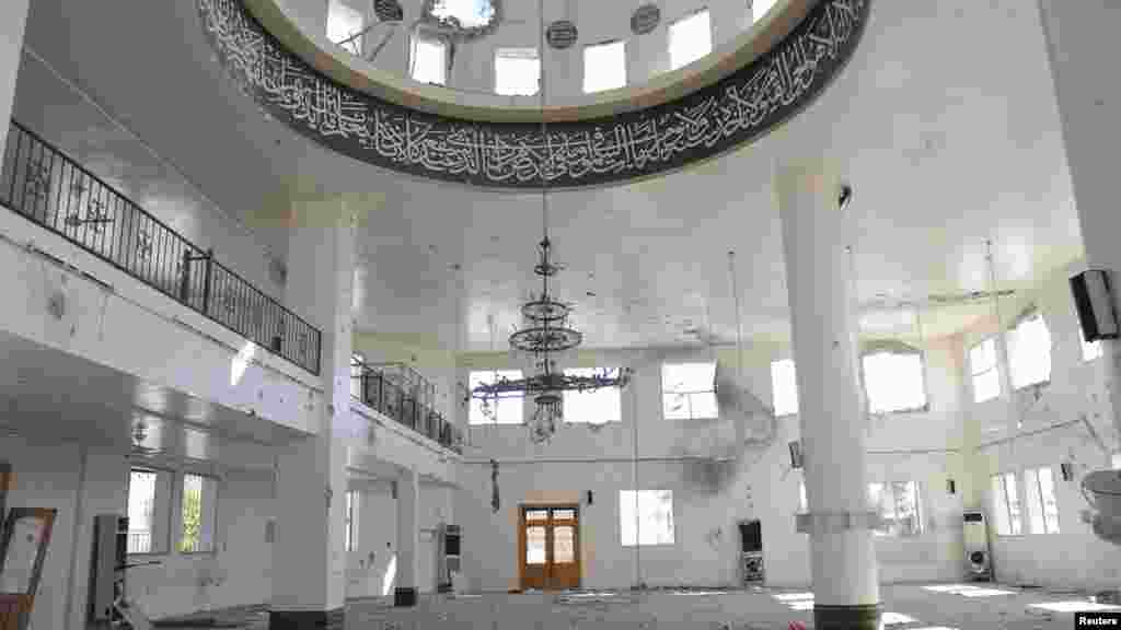 Damage in a mosque in al-Bouydah, south of Damascus, after soldiers loyal to Syria's President al-Assad took control of it from the Free Syrian Army, Oct. 17, 2013.