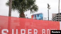 Super Bowl LV signage surrounds Raymond James Stadium ahead of the weekend's Super Bowl LV between the Kansas City Chiefs and Tampa Bay Buccaneers in Tampa, Florida, Feb. 6, 2021. 