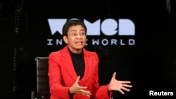 FILE - Maria Ressa takes part in the Women In the World Summit in New York City, April 10, 2019. The Norwegian Nobel Committee Friday awarded her and Russia’s Dmitry Muratovthe Nobel Peace Prize, Oct 8, 2021.