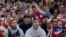 Alex Dubin, 17, center top, reacts with other U.S. fans while watching the 2014 World Cup soccer match between the United States and Germany at a public viewing party in San Francisco.
