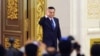 资料图片：2014年3月13日，中国总理李克强出席在北京人民大会堂举行的新闻发布会。（法新社）