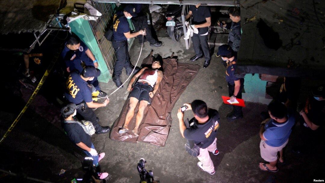 The body of a man whom police said was killed during a drug bust operation on "Shabu" (Meth), is seen in Manila, Philippines, Aug. 18, 2016.
