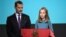 Spanish heiress of the throne, princess Leonor (R), reads the Spanish Constitution under the eyes of her father king Felipe VI, during a ceremony marking 40 years of its approval by the parliament, at the Cervantes Institute in Madrid, Oct. 31, 2018. 