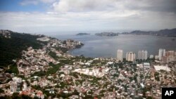 ARCHIVO - Esta imagen de septiembre de 2013 muestra una vista aérea de la ciudad turística de Acapulco, en el Pacífico, México.