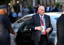 FILE - Former South African President F.W. de Klerk arrives for the State of the Nation Address in Parliament in Cape Town, Feb. 13, 2020.