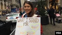 A protester standing up for her beliefs.