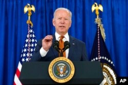 President Joe Biden talks about the May jobs report from the Rehoboth Beach Convention Center in Rehoboth Beach, Del., June 4, 2021.