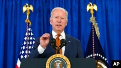 FILE - President Joe Biden talks about the May jobs report from the Rehoboth Beach Convention Center in Rehoboth Beach, Del., June 4, 2021.
