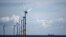 FILE - Wind turbines are seen at the Saint-Nazaire offshore wind farm, off the coast of the Guerande peninsula in western France, Sept. 30, 2022.