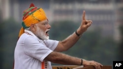 FILE - Indian Prime Minister Narendra Modi addresses to the nation on the country's Independence Day from the ramparts of the historical Red Fort in New Delhi, India, Aug. 15, 2019.