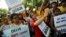 Protesting recent rapes, dozens of All India Students Association members demonstrate outside police headquarters in New Delhi, India, Oct. 18, 2015. 