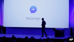 FILE - New features of Messenger are shown during the F8 Facebook Developer Conference in San Francisco, April 12, 2016.