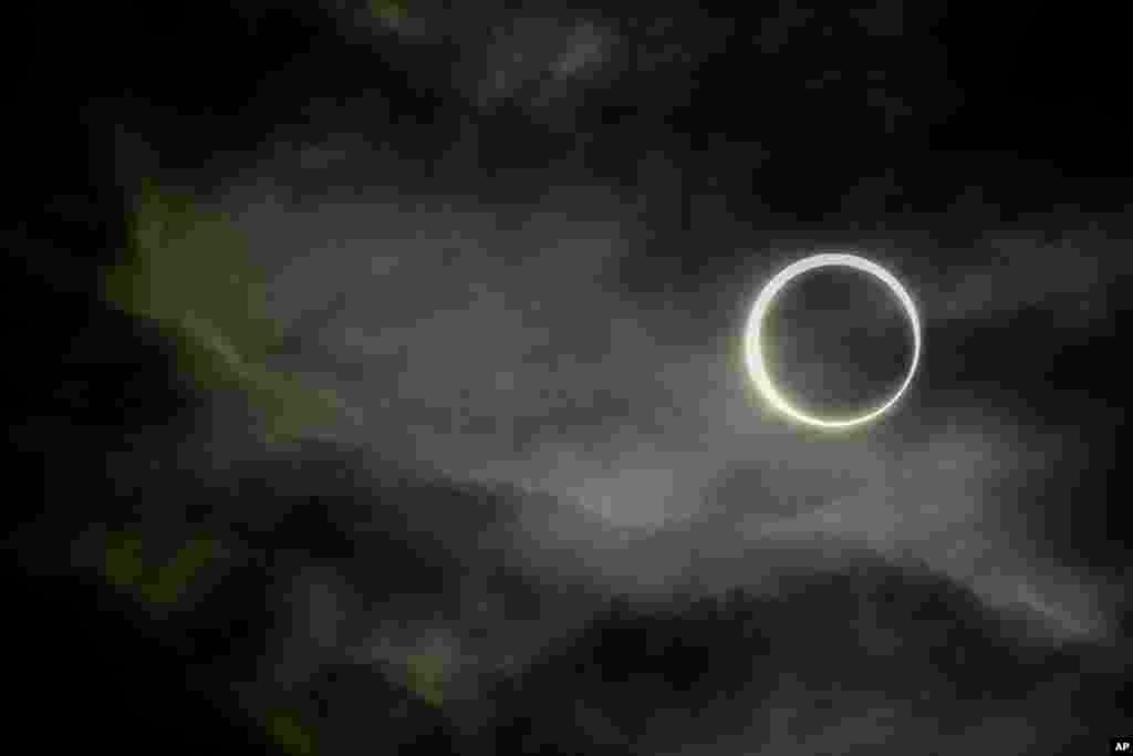 The moon moves past the sun during an annular solar eclipse in Puerto San Julian, Argentina, Oct. 2, 2024.