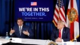 ARHIVA - Guverner Floride Ron DeSantis i tadašnji predsjednik Donald Trump na konferenciji o pandemiji koronavirusa na Floridi (Foto: AP /Patrick Semansky)