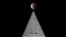 The Beaver Blood Moon partial lunar eclipse is seen above the Washington Monument in Washington.