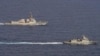 菲律宾军方2023年9月4日公布的照片显示美国海军“拉夫·约翰逊号”导弹驱逐舰(左)与菲律宾海军“何塞·黎刹号”导弹护卫舰在巴拉望岛以西海域联合航行。