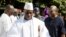 FILE - Yahya Jammeh, center, who has refused to step down as president of Gambia, is seen in Banjul, Gambia, Jan.13, 2017.