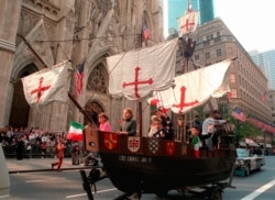 FILE - In this Oct. 14, 1996 photo, a model of the "Santa Maria," one of Christopher Columbus' three ships, is pulled up New York's Fifth Avenue in front of St. Patrick's Cathedral during the 56th Columbus Day Parade.