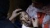 Child receives a polio vaccine in Islamabad, Pakistan, Oct. 16, 2012.