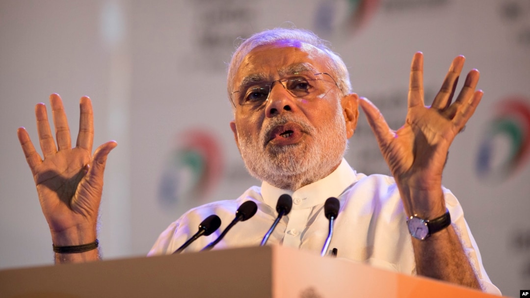 Indian Prime Minister Narendra Modi addresses people during the launch of a "Digital India" project in New Delhi, July 1, 2015.