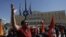 A municipality worker shouts slogans in front of the parliament during a rally against new austerity measures in Athens, October 3, 2012. 